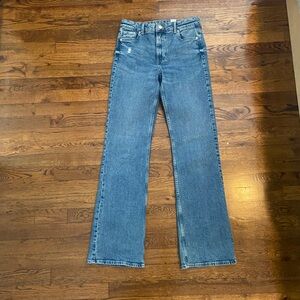 5-pocket jeans w/ gentle stretch High waist, zip fly, slim legs & flared hems